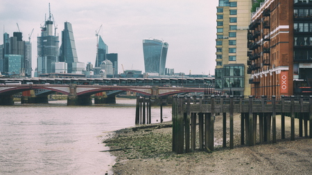 River Thames in low tide with perspective view on The City of London, United Kingdom, June 2018のeditorial素材