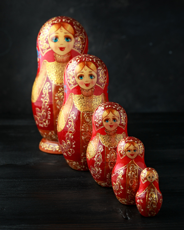 Beautiful Russian traditional nesting dolls matreshka on rustic background.の写真素材