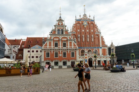 City Hall Square with House of the Blackheads and Saint Peter church in Riga Old Town, Latvia, July 24, 2018のeditorial素材