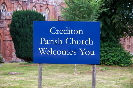 Crediton Parish Church sign, Devon, United Kingdom July 20 2018のeditorial素材