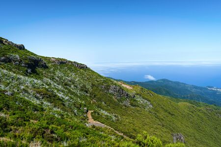 Beautiful panorama view of the footpath trail in the mountains of Pico Ruivo, Madeira.の写真素材