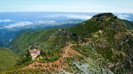 Beautiful panorama view of the footpath trail in the mountains of Pico Ruivo, Madeira.の写真素材