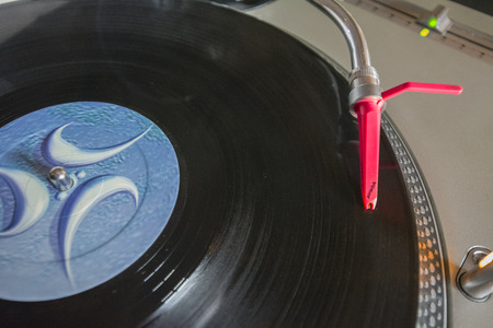 Playing vinyl on turntableの写真素材