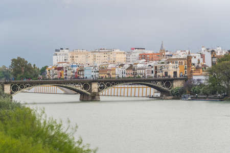 The tourist Torre del Oro in Seville, next to the Guadalquivir river, Andalusia (Spain).のeditorial素材