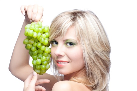 young girl with grapeの写真素材