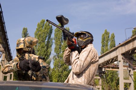Two paintball players, outdoors の写真素材