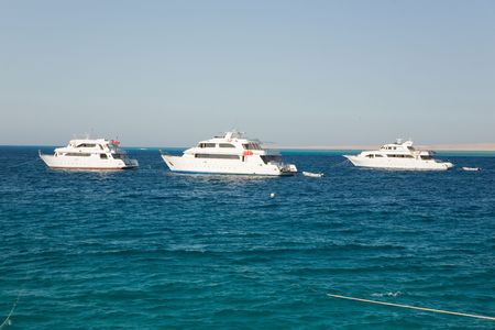 Three boats in the sea, outdoor shotの写真素材