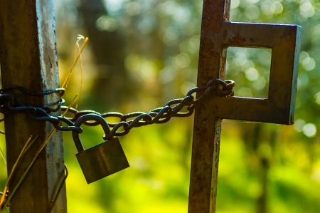 A gate closed with a lock and a chain
