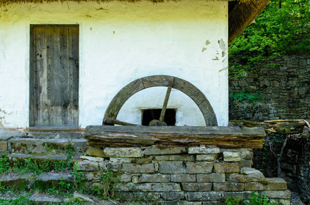 Detail of a typical ukrainian antique water mill, in Pirogovo near Kiev