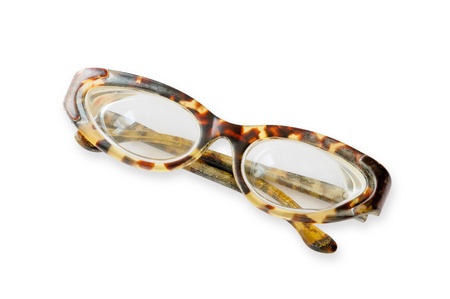 Old tortoise spectacles on a white backgroundの写真素材