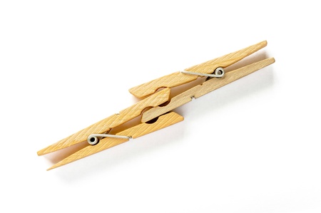 Two wooden clothespins on white backgroundの写真素材