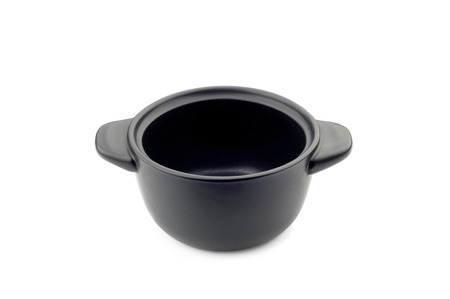 A little oven dish in black ceramic on a white backgroundの写真素材