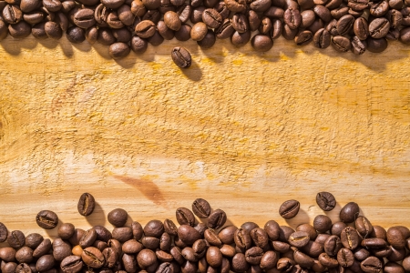 coffee beans and light wood textureの写真素材