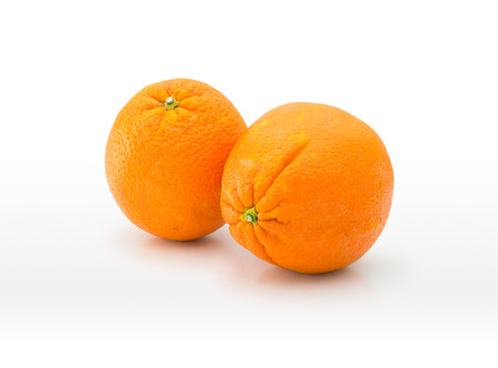Two nice juicy natural oranges isolated on white backgroundの写真素材