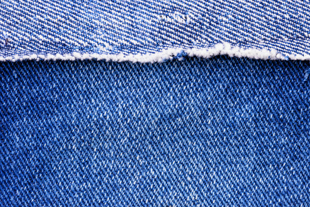 Macro of a blue jeans texture, denim fabric closeupの写真素材