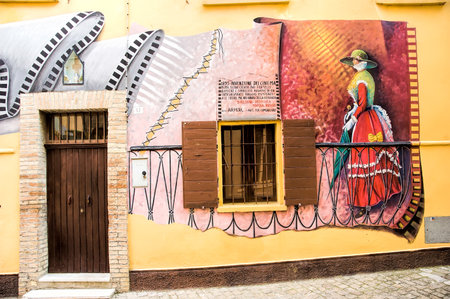 Saludecio/Italy - March 15, 2005: A mural painting in Saludecio illustrating the invention of the...