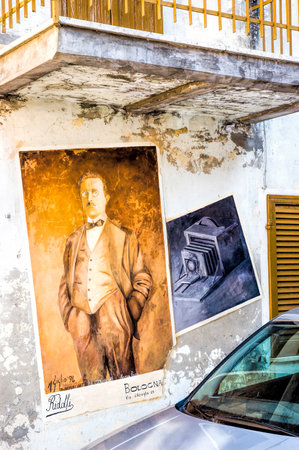 Saludecio/Italy - March 15, 2005: A mural painting in Saludecio illustrating an invention from the XIX century:のeditorial素材