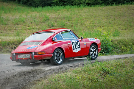 Cremona / Italy -  September 7, 2005 - Unidentified drivers on a red vintage Porsche 911 S racing...
