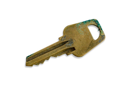 Scratched and ruined old modern key, isolated on white backgroundのeditorial素材
