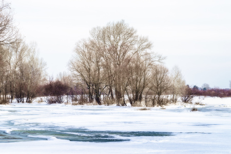 Landscape with frozen water, ice and snow on the Dnieper river in Kiev, Ukraine, during winter