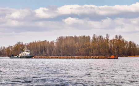 Barge on the Dnieper river in Kiev, Ukraine, at the beginning of springの写真素材