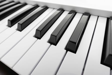 Close up detail on the black and white keys of a music keyboard, with copy space for textの写真素材