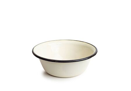 Old enamel dishe, or bowl, isolated on white backgroundの写真素材