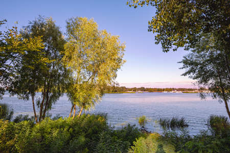 The Dnieper River seen from Natalka Park in Kiev, Ukraine, during a beautiful sunny day at the end of summerの写真素材