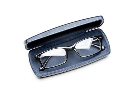 Modern spectacles, or eyeglasses, in a dark blue leather case, isolated on a white backgroundの写真素材