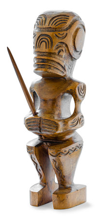 A wooden Tiki, a pagan god from French Polynesia, isolated on white backgroungの写真素材