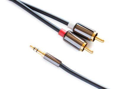 Gold-plated audio cable RCA to Jack 3.5 mm, isolated on white backgroundの写真素材