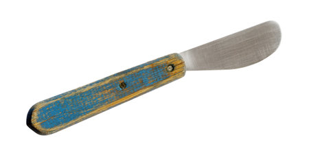 Old butter knife with blue wooden handle isolated on white backgroundの写真素材