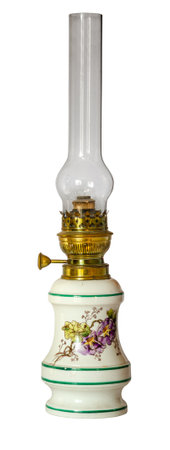 Antique glass and porcelain oil lamp isolated on white backgroundの写真素材