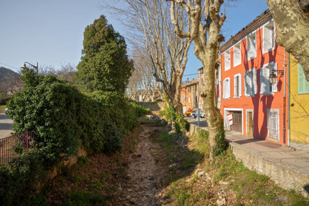 View of a dry creek in the small town of La Roquebrussane in the Var department, in the Provence region of Franceのeditorial素材