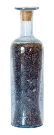 French glass bottle, bubble glass, filled with lenses, isolated on a white backgroundの写真素材