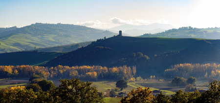 View of an ancient tower on Montefeltro in Italy's Marche region, near Tavoleto, in autumn.の写真素材