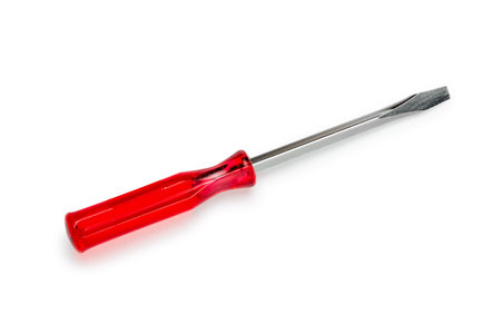 Flat screw driver with red handle, hand tool screwdriver, isolated on white backgroundの写真素材