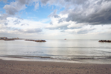 View of Riccione and Rimini from Cattolica, in Emilia Romagna a regione of Italy, in winter under a cloudy skyの写真素材