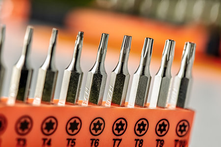 Detail of torx and torx security magnetic precision screwdriver bits on white backgroundの写真素材