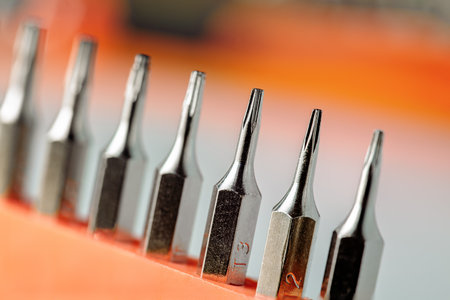Detail of torx magnetic precision screwdriver bits on white backgroundの写真素材