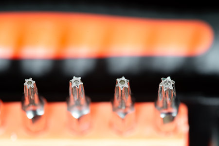 Detail of torx magnetic precision screwdriver bits on white backgroundの写真素材