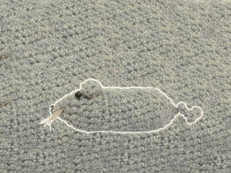 The knitted grey mouse.の写真素材