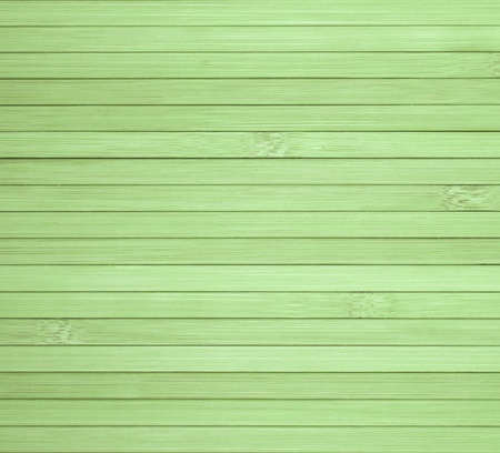 Background made of horizontal green bamboo laths.の写真素材