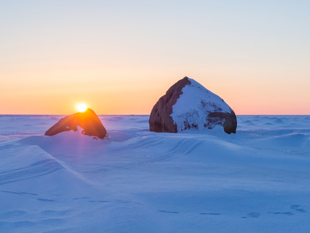 Beautiful winter landscape. Sunset in ices. Baltic Sea. Gulf of Finland. Russia.の写真素材
