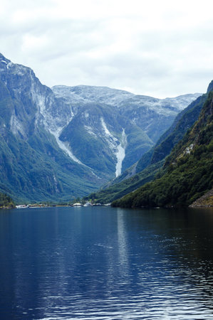 Picturesque landscape mountains of Norway. Beautiful view of the lake. Rocky shore of mountain lake.の写真素材