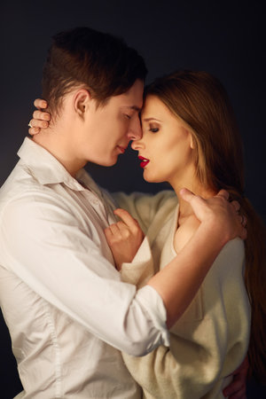 Hot Sexy couple in love close to each other. Erotic pose. Kissing and hugging.の写真素材