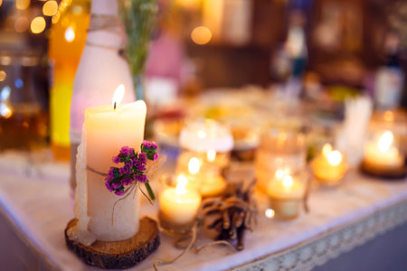 Beautiful table setting with crockery and flowers for a party, wedding reception or other event.の写真素材