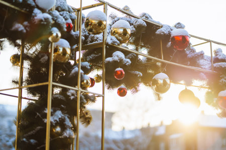 Close up of balls on christmas snowy tree. Christmas decorations. New year concept. winter holidays.の写真素材