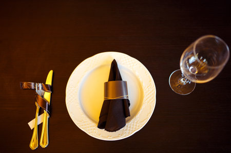 Champagne glasses on gold background. Party and holiday celebration conceptの写真素材