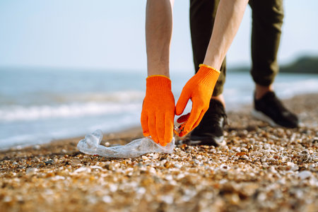 Empty plastic bottles on the beach,. Trash on the beach. Seashore and water pollution concept.